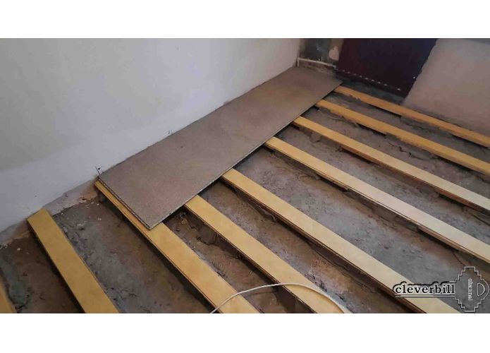 Floor repair, installation of beams, chipboard flooring