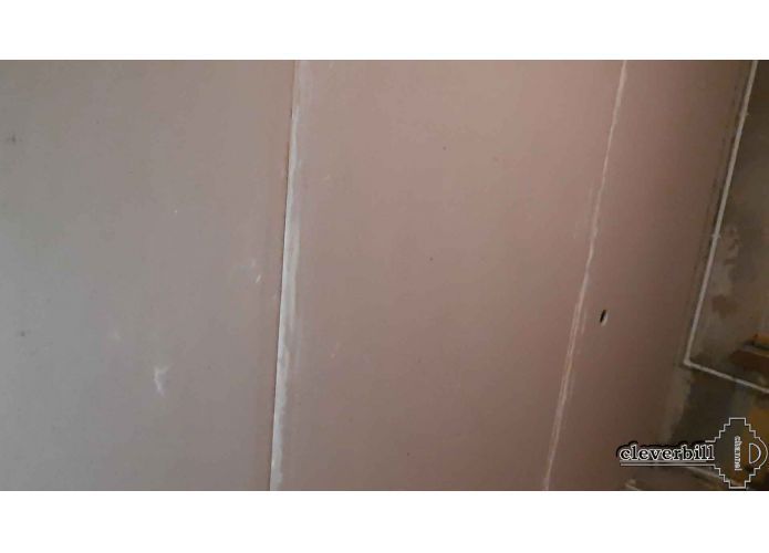 Installation of drywall on glue