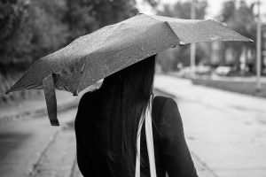 Rain, woman with an umbrella